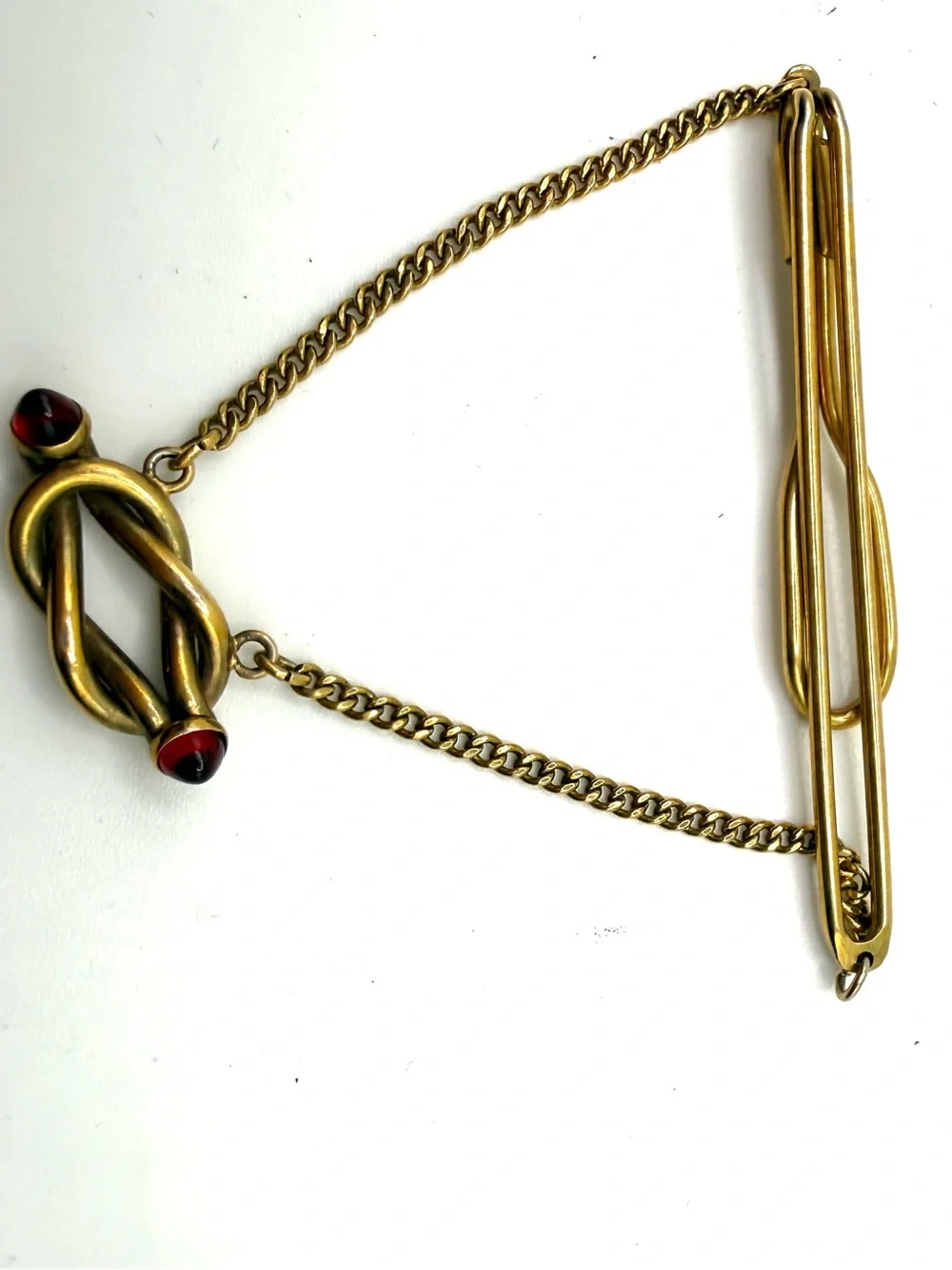 SWANK Gold-Tone Knot Tie Bar with Red Cabochon Terminals and Safety Chain